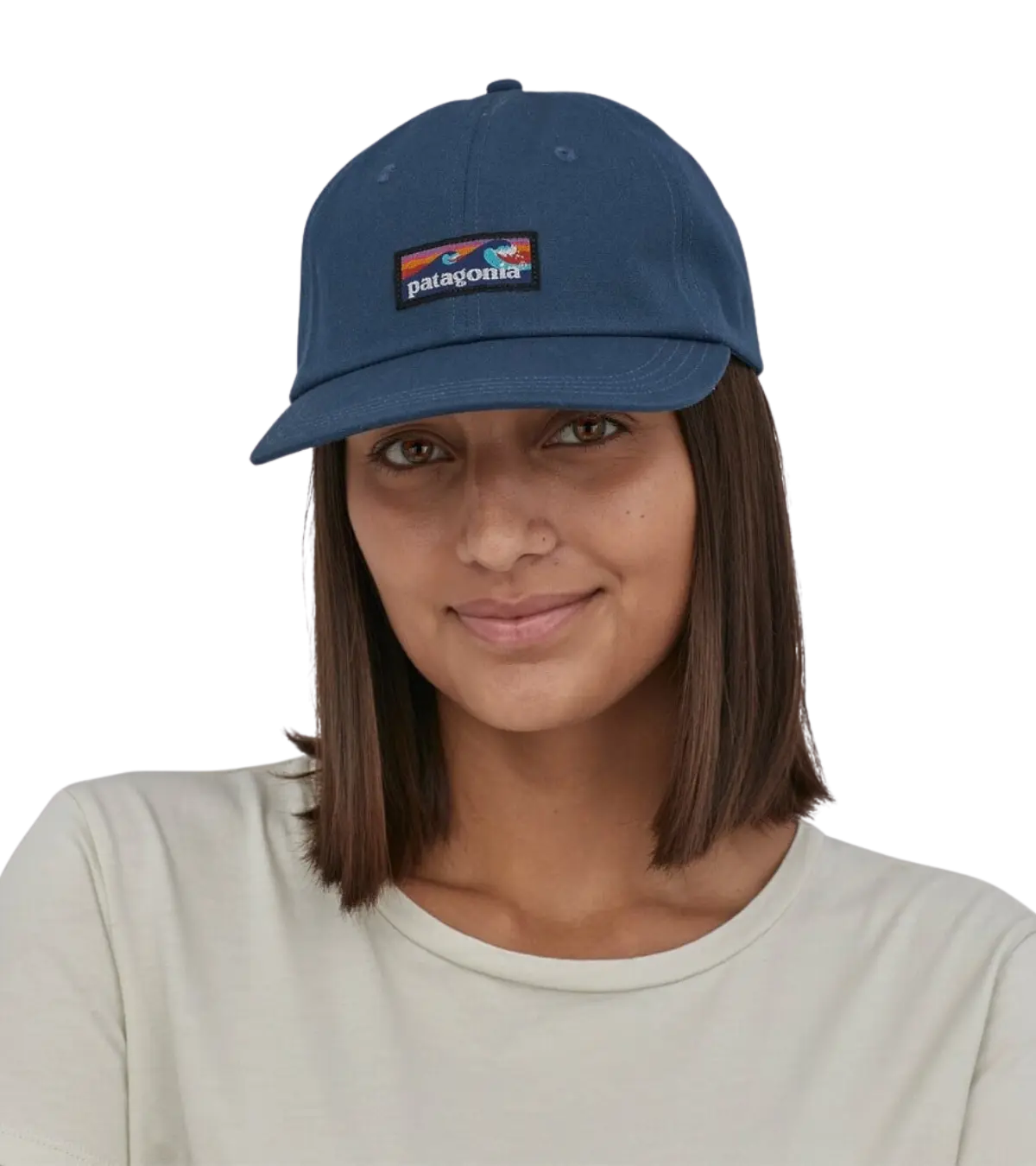 woman wearing a patagonia trad cap