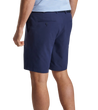 man wearing a peter millar Surge Performance Shorts (9" Inseam)
