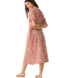 woman wearing a faherty carmel dress