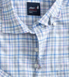 Man wearing a Johnnie-O Alzer Performance Button Up Shirt