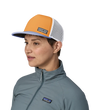 woman wearing a patagonia Duckbill Trucker Hat