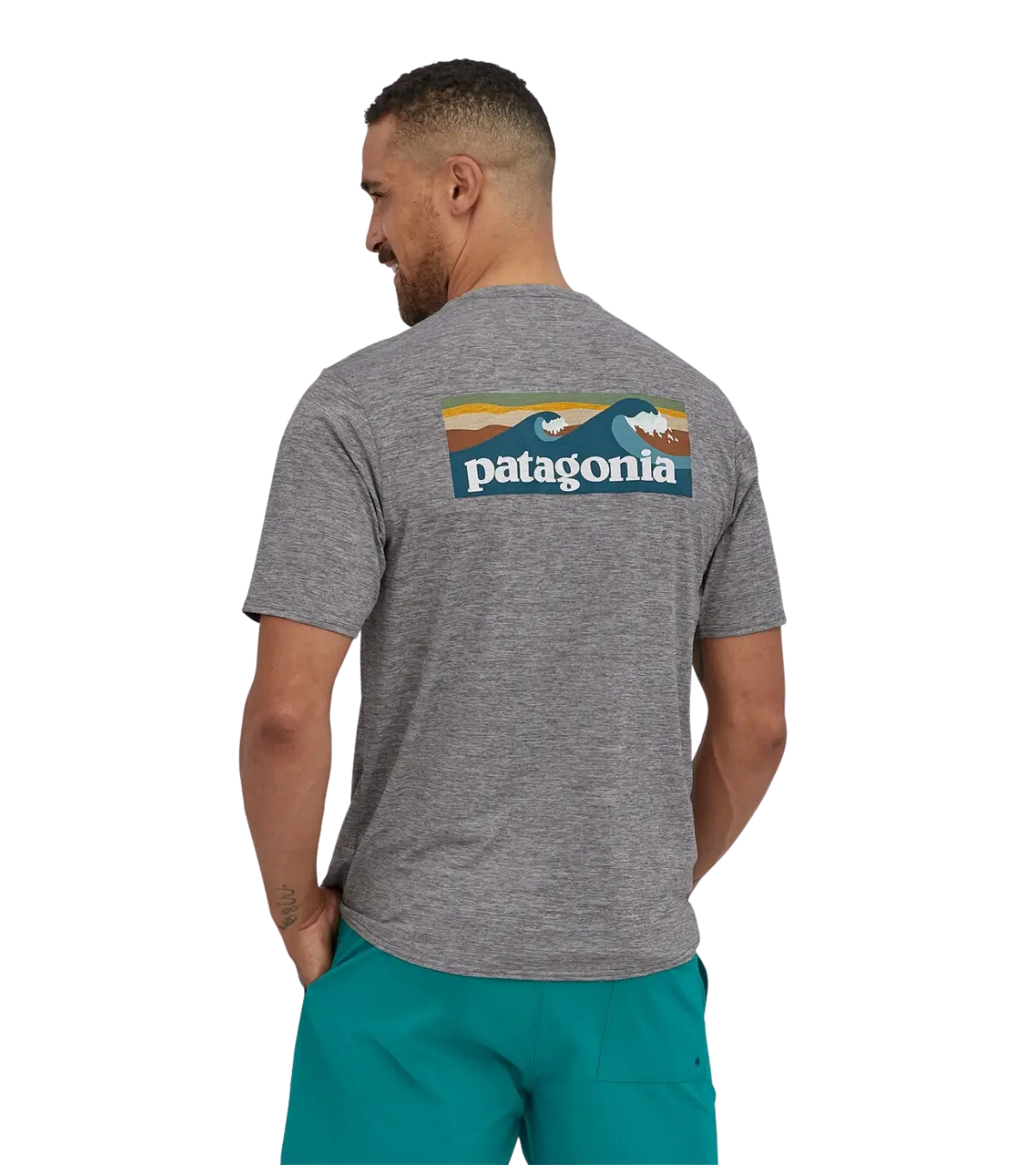 man wearing Patagonia, Men's Capilene Cool Daily Graphic Tee Shirt (Grey)
