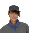 woman wearing a patagonia P-6 Label Maclure Hat