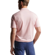 man wearing a peter millar excursionist flex polo