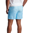 man wearing a peter millar Stingray Scatter Swim Trunk