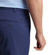 man wearing a peter millar Surge Performance Shorts (9" Inseam)