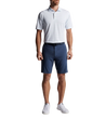 man wearing peter millar shorts