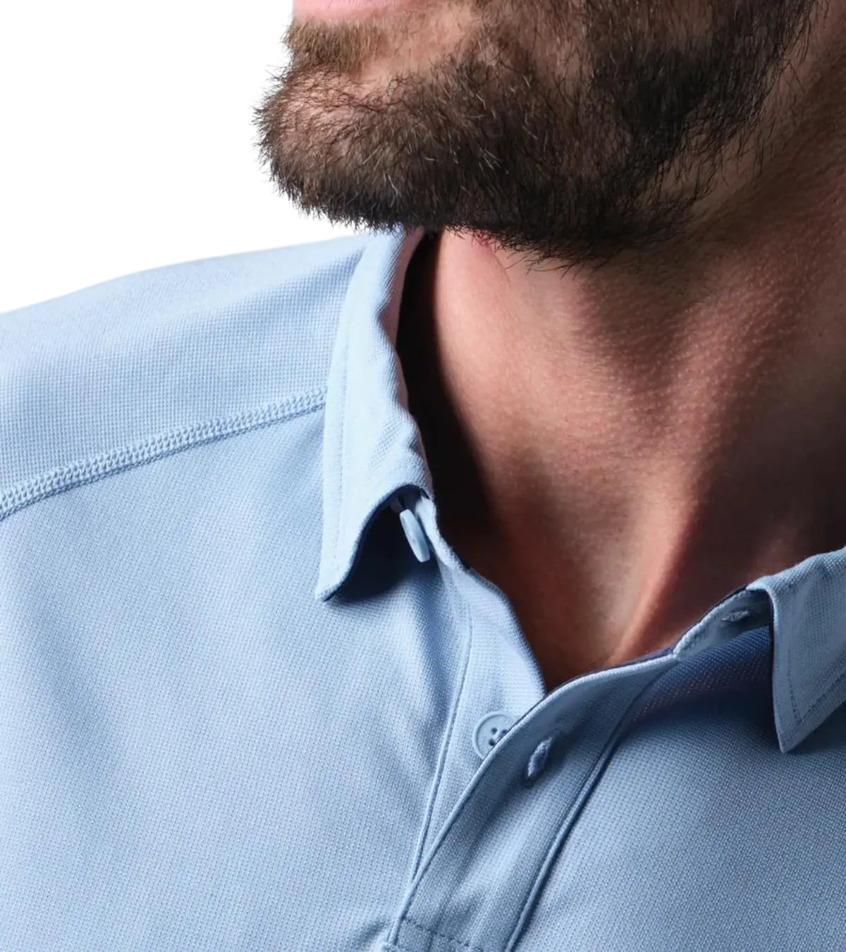 man wearing a rhone Delta Pique Polo Shirt