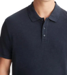 man wearing a vince Classic Slub Polo Shirt